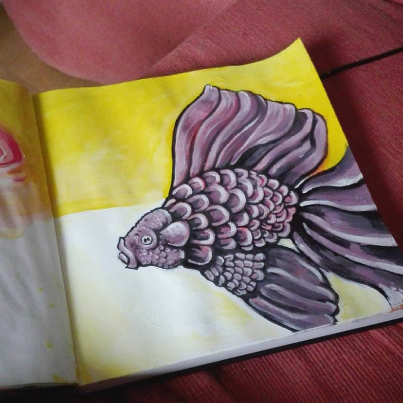 An acrylic painting of a fish