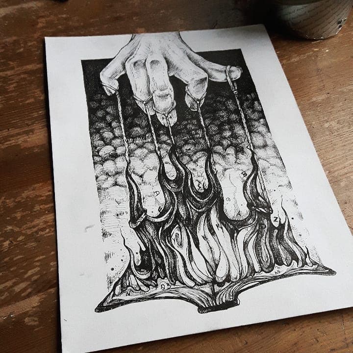 An ink illustration of a hand handling fire that burns out of a book.